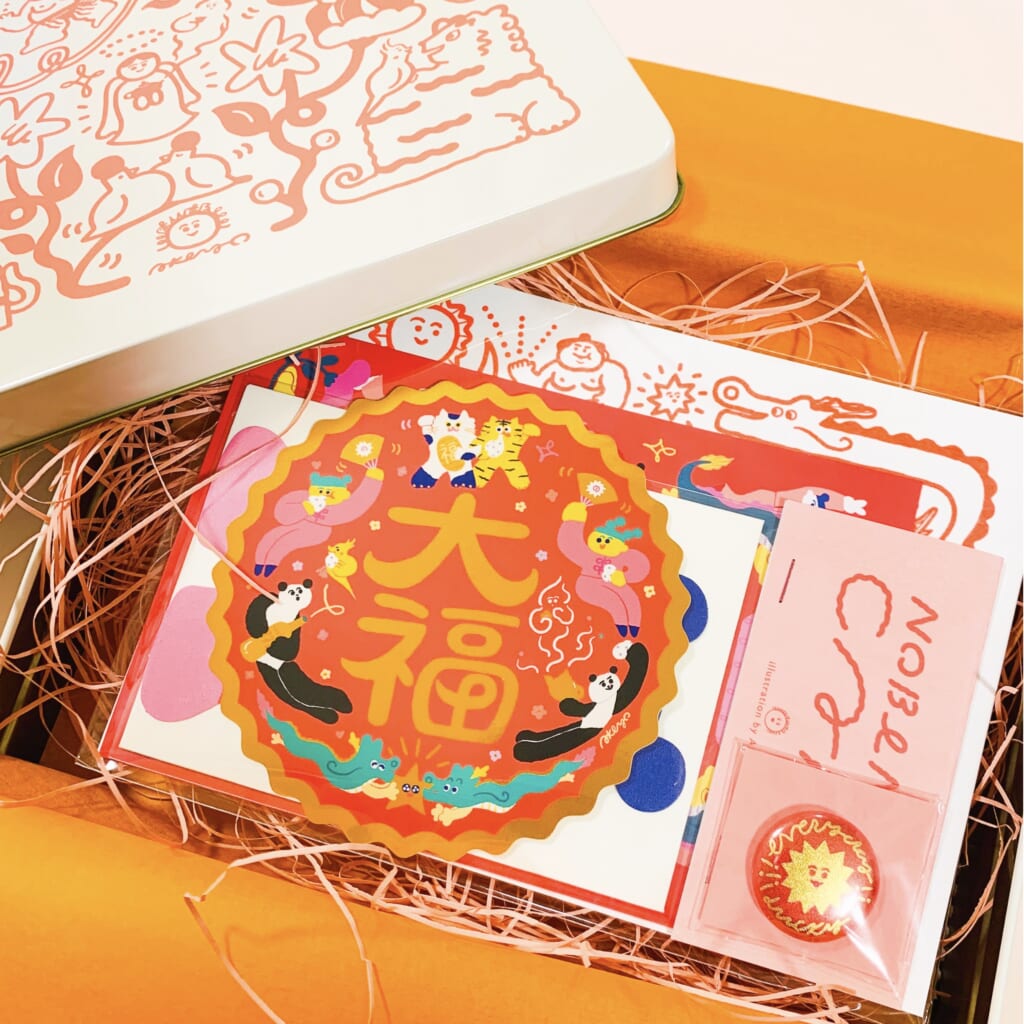 「LUCKY缶」LUCKYをテーマにしたアイテムがもりもり入ったスペシャルな缶。その場で描くイラストサイン付き！