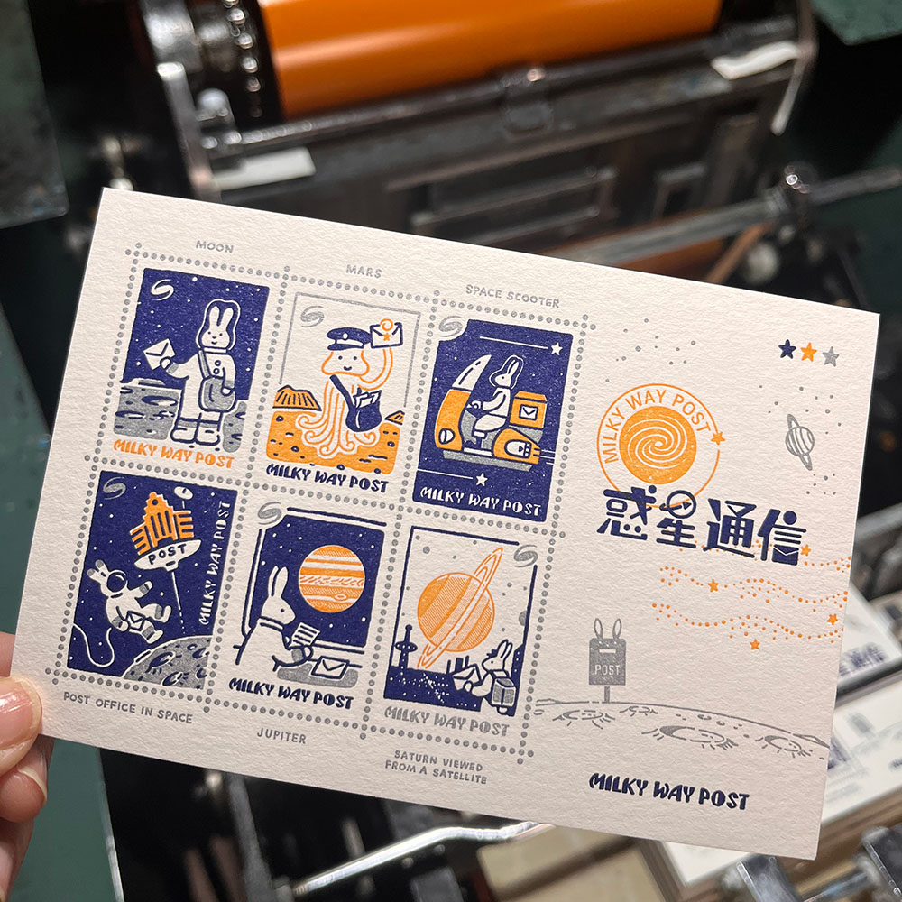 「MILKY WAY POST　惑星通信ハガキ」切手シート風ハガキです。