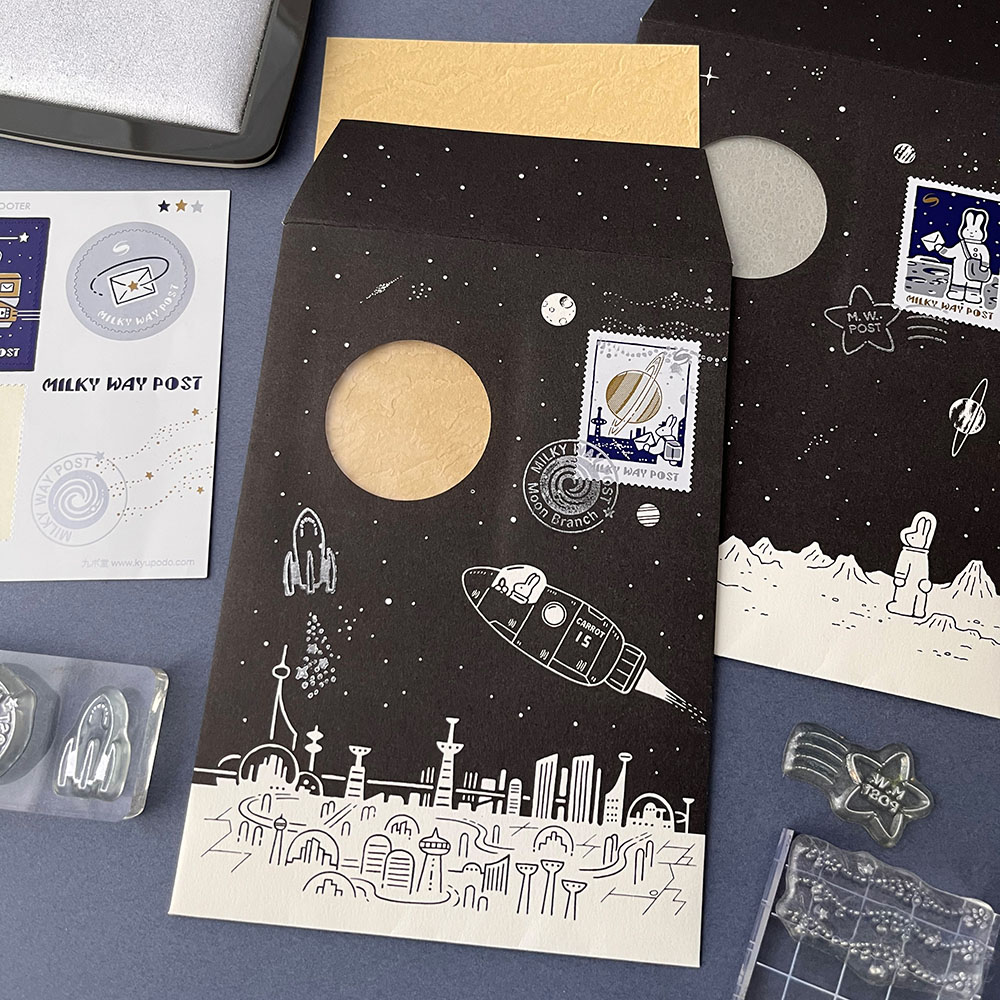 「惑星通信LETTER SET」質感のある紙を惑星の模様に見立てたセットと別売切手風シート。MILKY WAY POSTスタンプと相性抜群です。