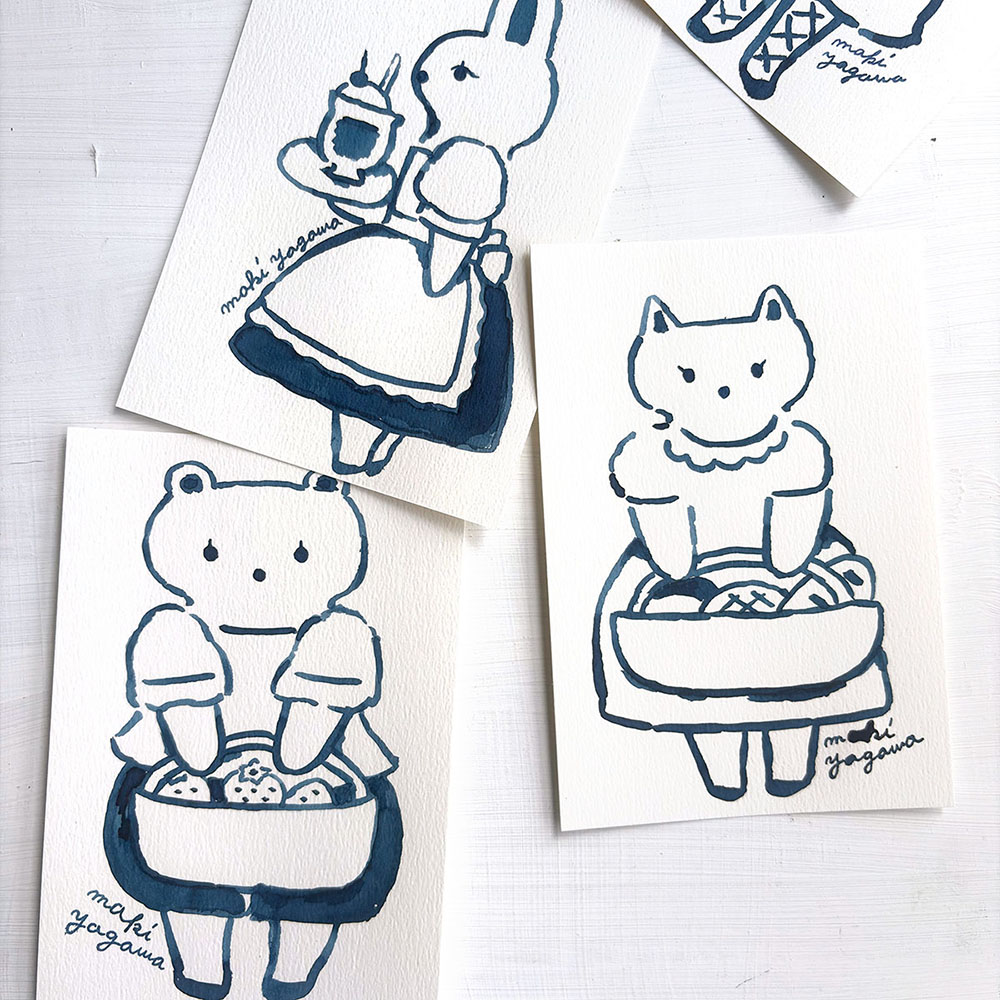 「あいの似顔絵やさん」藍＝愛＝I。藍色のインクで描く「あい」の似顔絵屋さんです。あなたに似た子をどうぞ。