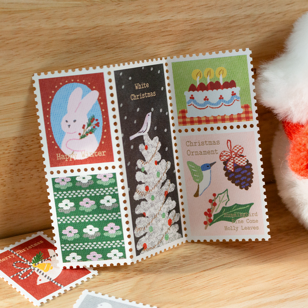 「冬の切手ポストカード」寒い冬は、あたたかい気持ちで。お手紙やダイアリーをデコレーションできる、切手モチーフのポストカードです。
