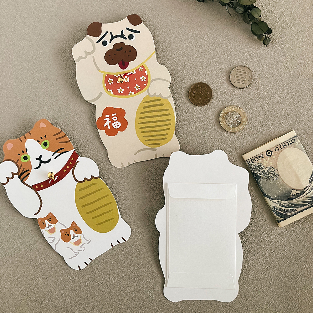 「ダイカットポチ袋」鈴つきダイカット招きカードのぽち袋バージョン。後ろにぽち袋がついています。税込450円。