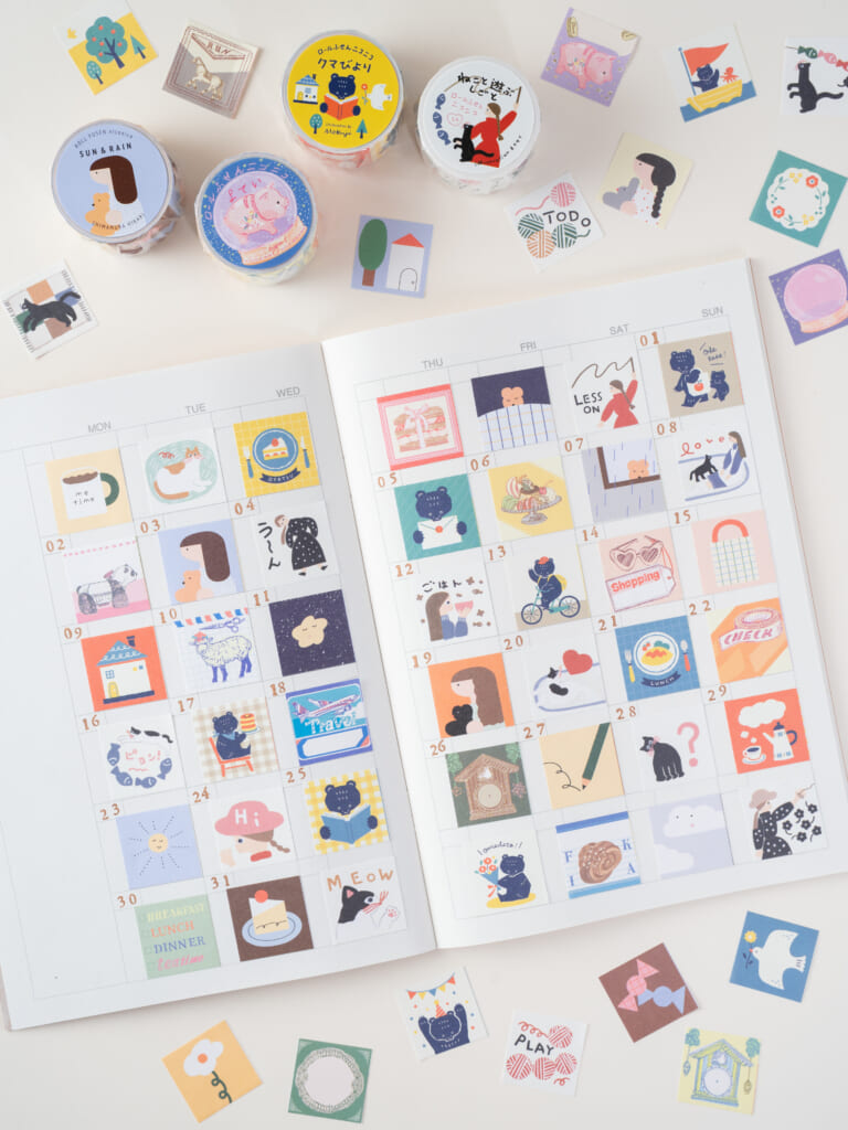 「ロールふせんニコニコ」ふせん1枚分が手帳のマンスリーページ1マス分ほど。いのうえ彩さん、しまむらひかりさん、ネクタイさん、Mokujiさんから新作です