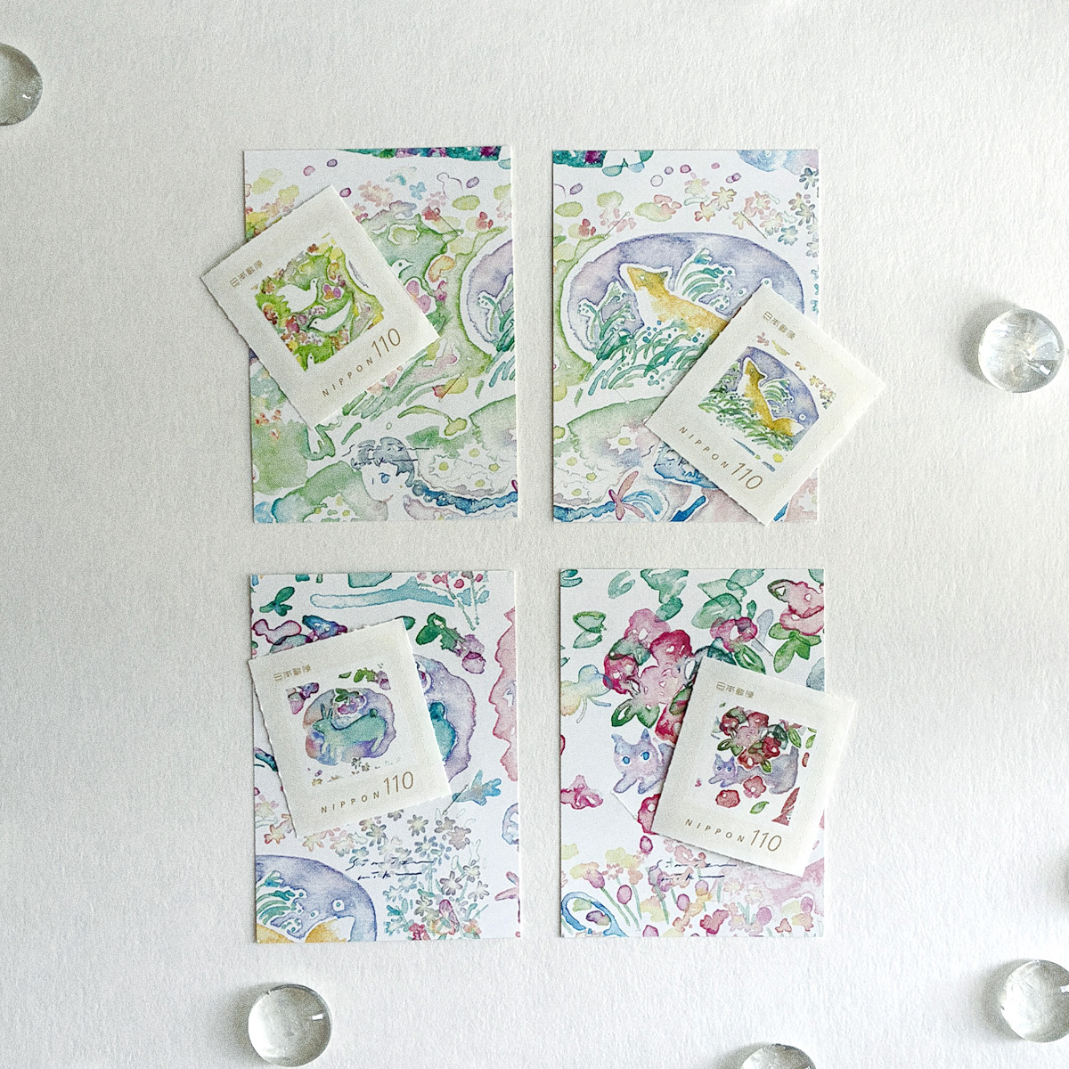 新作「110円切手」送った後も絵の記憶が残る台紙つき。ばらばらで販売します。