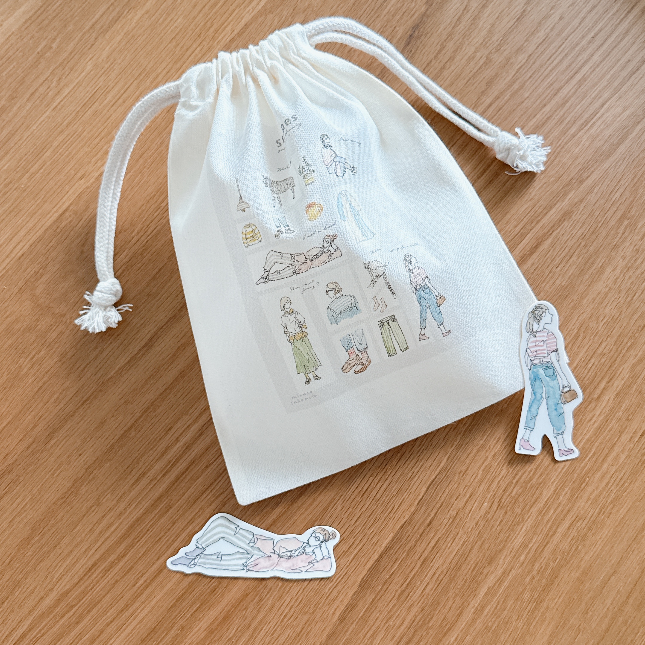 「新作しましま巾着」しましまをモチーフに描いたデザインの巾着